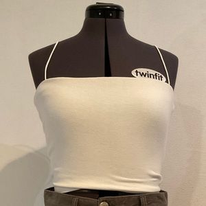 Medium Better Be brand white spaghetti strap crop top.